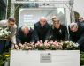 Instead of cutting the ribbon during the opening ceremony, plants were seeded symbolically.