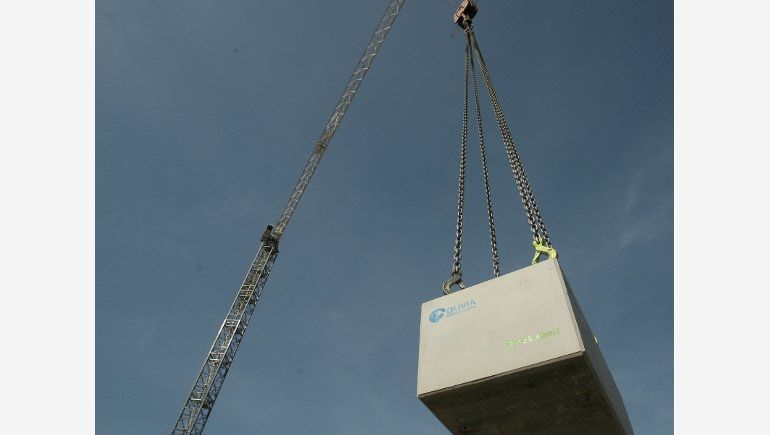 At the image: laying the foundation stone of Olivia Point