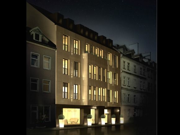  - Nocna wizualizacja biurowca przy ul. Woźnej/ projekt Ipnotic Architecture