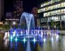 Fountain with backlighted streams of different size