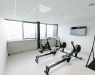 Gym in a show office of First Property Poland