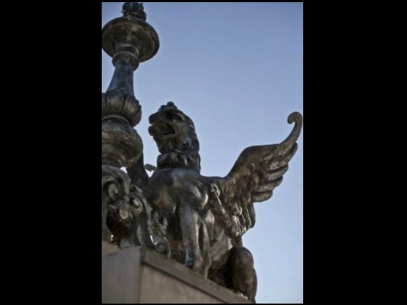  - The name of tenement house descend from sculptures on the roof's corners