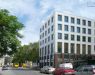 The new office block draws on the old printing house's design.