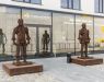 Stacja Biznesu - sculptures of "Iron People" by Zbigniew Frączkiewicz in front of the building